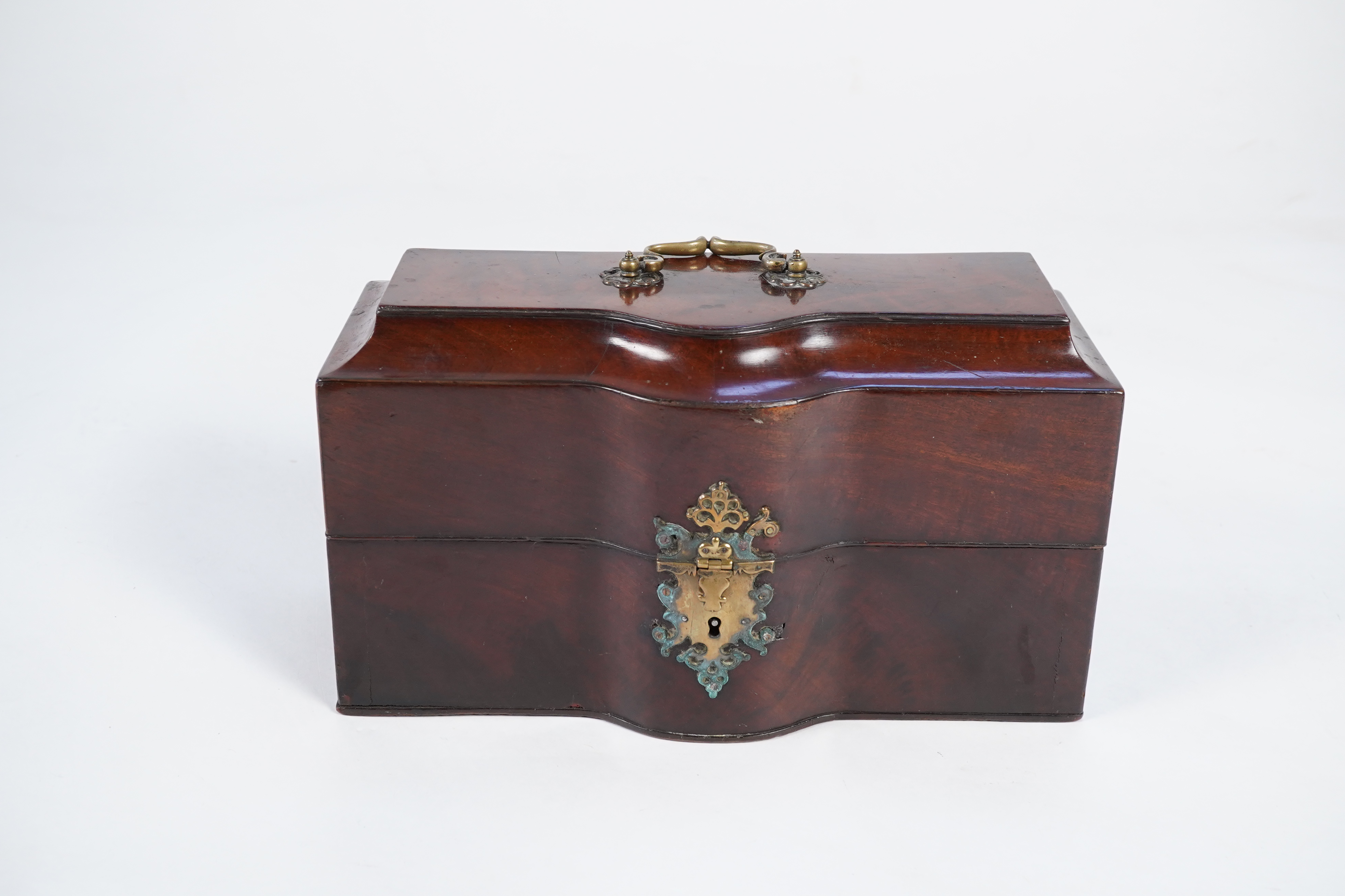 A George II mahogany cased set of two early George III silver tea caddies and covers and a sugar vase and cover, by Samuel Herbert & Co